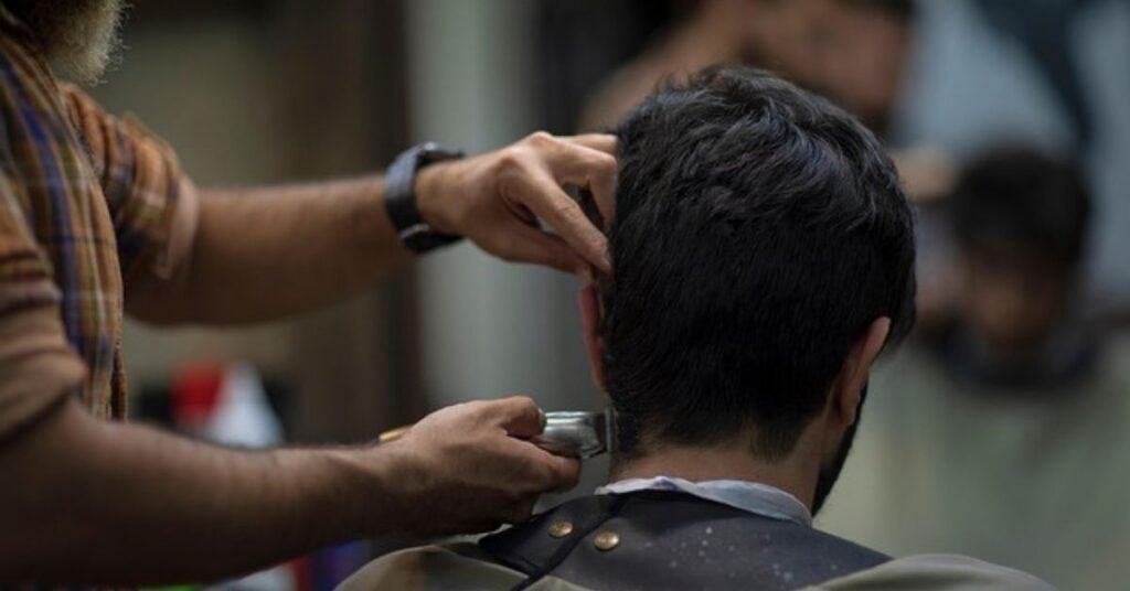 men haircut with neat sides and textured top