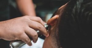low fade haircut styles black with clean side blend