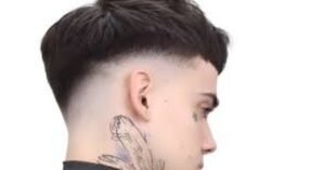 Mid Taper Fade with Textured Fringe