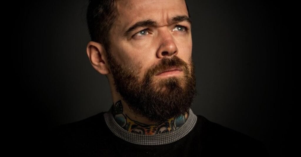 guys shaggy haircut with messy natural layers