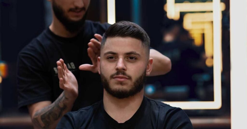 medium fade hairstyle for Black men with textured top