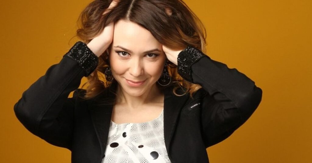 mature woman with soft waves hairstyle